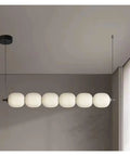 White Glass Bulb Chandelier Long Glass Pendant Lamp for Bedroom Living Room Restaurant LED Pendant Light, modern design with six glass orbs.