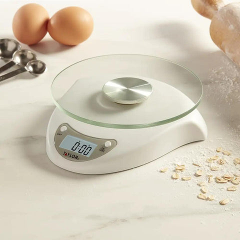 Digital Kitchen Scale With Glass Platform, Tare Button, White Plastic Body, 11 Lb 5 Kg Capacity on a kitchen counter
