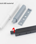Components of Magnetic Touch Cabinet Catch Set with Dampers for Soft Open Close 3 Piece Gray Kit laid out on white surface.
