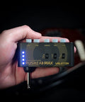USB Rechargeable Portable Pocket Guitar And Bass Headphone Amp With Plug In Multi Effects held in hand