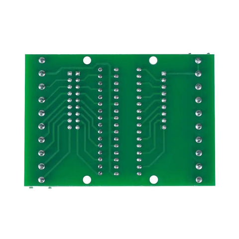Reverse side of 8 Channel Optocoupler Isolation Board For DC 3.3V To 5V Inputs, showing solder joints and circuit pathways.