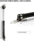 Image of a black pneumatic door lift for kitchen cabinets, 10-inch length with round mounting plates and screws. Six Pack 100N Gas Struts for 10 Inch Cabinet Doors Cabinet Shocks and Lift Supports with Round Mounting Plates Screws Included Pneumatic Door Lift for Kitchen Cabinets and More shown in detail.