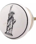 Black And White Ceramic Kids Dresser Knobs Set 25 Pack Durable 1.5 Inch Cabinet Pulls with Statue of Liberty design for nursery rooms.