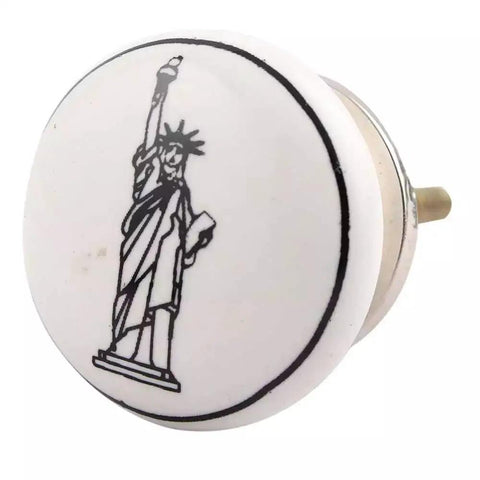 Black And White Ceramic Kids Dresser Knobs Set 25 Pack Durable 1.5 Inch Cabinet Pulls with Statue of Liberty design for nursery rooms.