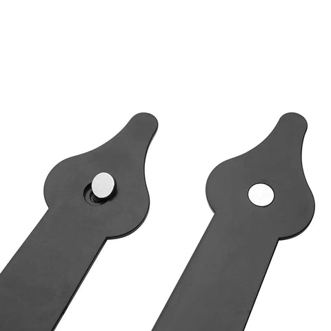 Heavy Duty Premium Garage Door Hardware Kit Featuring Decorative Handles And Sturdy Steel Hinges For Dead Nuts Closure And Zero Sweat Residential Upgrade Project. Close-up of black steel hinges with decorative ends.