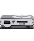 USB and micro SD slot of Clip On MP3 Player With USB Cable And Earphones Ultra Lightweight Portable Music Player For Running And Hiking Screenless Mini MP3 Player For Sports Black.