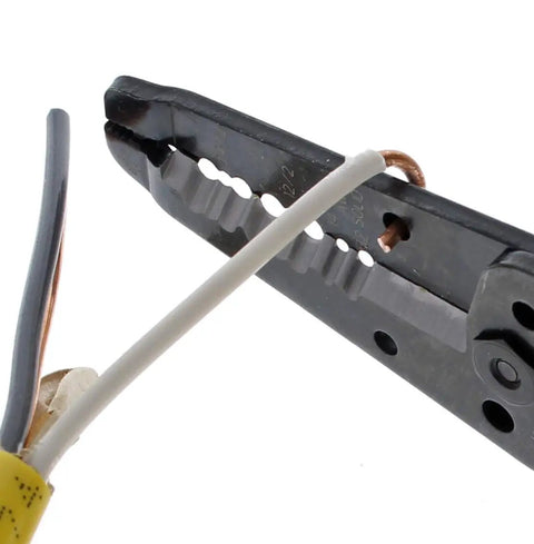 Reflex Super NM Cable Stripper For 12/2 And 14/2 Solid NM Wire cutting a wire with its dual stripper heads