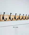 Heavy Duty Wall Mount Coat Rack With Seven Rugged Zinc Hooks For A Slick Entryway And No Sweat Organization Of Puffer Jackets Gym Towels And Baseball Caps, 86.8cm length, black hooks on wood.