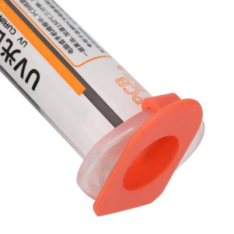 Close-up of syringe tube, part of 2 Pack UV Curable Solder Mask Ink In Black And Green For PCB Repair And BGA Protection Tough Insulation