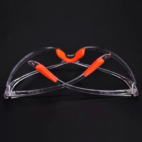 Four Pack Real Deal Fogless Safety Glasses With Thick Padding And Rounded Edges Windproof Splash Goggles designed with bright orange accents.