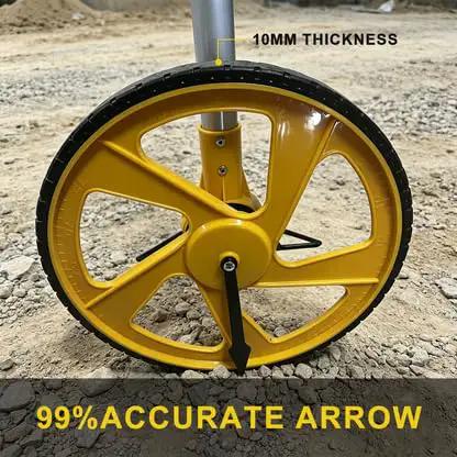 Close-up of the yellow wheel of the Solid Setup Smart Measuring Wheel With Bluetooth App Mapping And Backlit Lcd Screen For No Stress High Precision Survey Work And Snazzy Cad File Export Options, showing 10mm thickness.