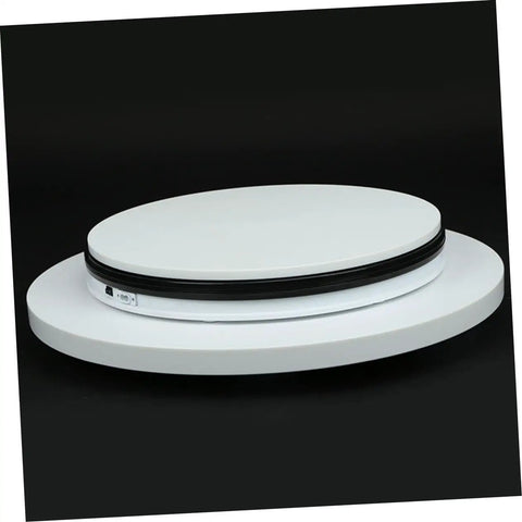 Stunning White Motorized Rotating Display Stand With Mirror Finish Turntable For Jewelry Watches Digital Gadgets And Collectibles 5Kg Capacity Smooth Spinning Showcase For Photography Retail Stores, side view.