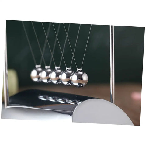 Side view of Z Shape Newton Cradle Pendulum Desk Toy For Home Office Decor with silver balls and black base