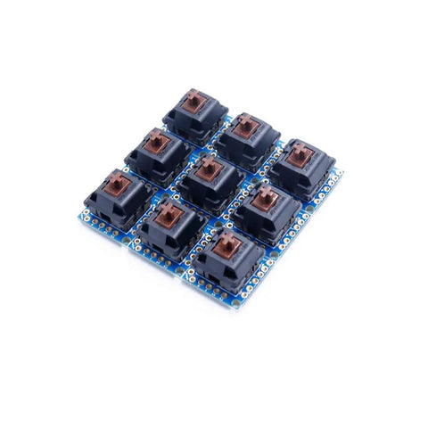 Nine Piece Key Switch Breakout Prototype PCB Board Compatible With Cherry MX For DIY Mechanical Keyboard Projects And Breadboard Prototyping With Full Pin Compatibility And Easy Hookups blue PCB with nine Cherry MX switch sockets