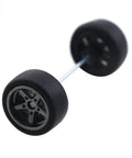 Close-up of a wheel from the Eight Piece Toy Car Wheel Set with 10mm rubber tires and metal axle, durable and smooth rolling for DIY projects.