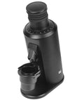Single Dose Espresso Coffee Grinder With Killer 80mm Stainless Steel Flat Burrs And Totally Smooth Stepless Adjustment Dial For Clutch Extraction In Modern Matte Black Build, top view with adjustable dial and grind cup.