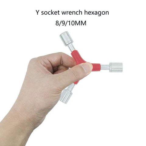 Hand holding Y Shaped Bicycle Wrench Tool Set For Quick Bike Repairs With External Three Way Hex Wrenches 8 9 10 Mm