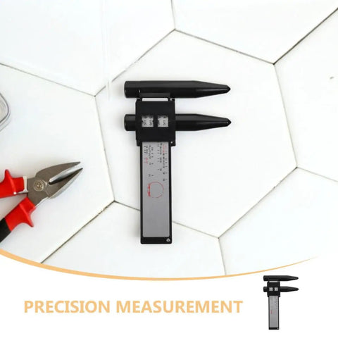 OHPHCALL 2pcs Wheel Hub Diameter Ruler ABS Measuring Tool for Automotive positioned on white hexagonal tiles.