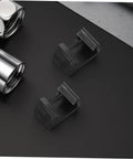 Close-up of 2 Heavy Duty Wicker Rattan Furniture Clamps 8 Pack Plastic Fasteners For Outdoor Patio Sofa Garden on black surface.