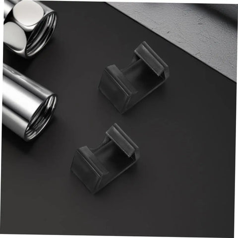 Close-up of 2 Heavy Duty Wicker Rattan Furniture Clamps 8 Pack Plastic Fasteners For Outdoor Patio Sofa Garden on black surface.