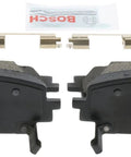 Front view of Bosch BC2380 QuietCast ceramic brake pad set with mounting hardware, two pads