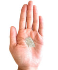 Hard Silver Solder Chips 3 Grams Approx 2000 Pieces 0.5 By 1.0 By 0.25mm Tiny Lead Free Cadmium Free Made In USA in palm