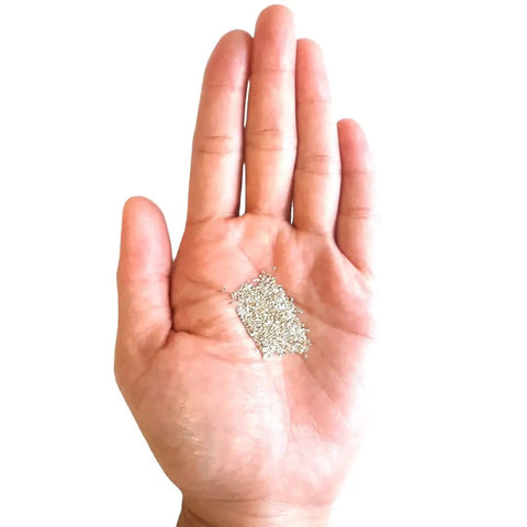 Hard Silver Solder Chips 3 Grams Approx 2000 Pieces 0.5 By 1.0 By 0.25mm Tiny Lead Free Cadmium Free Made In USA in palm