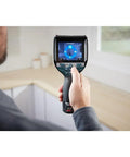 Person using 12V Max Connected Thermal Camera With 500 Sharp Thermal Images Storage for electrical inspection, one-tap interface visible.