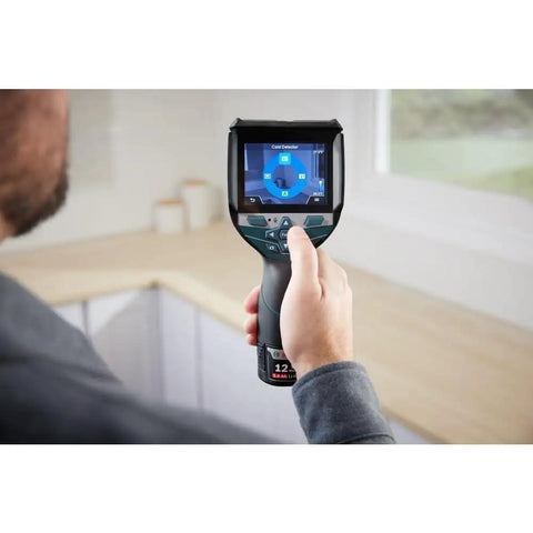 Person using 12V Max Connected Thermal Camera With 500 Sharp Thermal Images Storage for electrical inspection, one-tap interface visible.