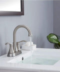 2-Handle Brushed Nickel Bathroom Sink Faucet With 360 Degree Swivel High Arc Spout and 4 Inch Centerset in use with water flowing