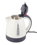 Portable 1000 ML 24V Automotive Car Kettle With Stainless Steel Plate For Quick Brewing Of Hot Coffee And Tea No Hassle Road Warrior Approved During Long Drives, white kettle with black details.