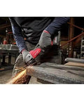 Top Shelf Brushless M18 Compatible Angle Grinder Kit Ships Loaded In Rugged Contractor Bag Featuring Smart Charge Sync And Beast Mode Torque For Serious Crews Jobsite, operator grinding metal.