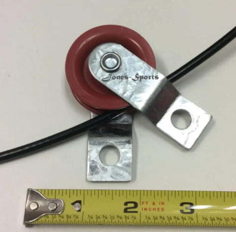 Heavy Duty Pulleys With Zinc Carabiner Snap Clips For Netting And Baseball Batting Cage Setup 100 Pack, shown with red wheel next to ruler