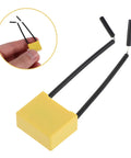30 Piece Flexible Microfarad Capacitor Kit With 0.22uf Precision Testing Parts For Industrial Gear featuring yellow capacitor with black wires.