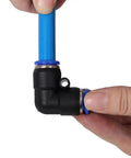 Badass 60 Foot PU Air Hose Line Kit With Push To Connect Fittings Dope Flexibility For Garage Shops And Tight Spaces Killer For Air Tools Pneumatic Nail Guns Real Deal Toughness In Cool Blue Color Gets The Grind Done. Blue PU air hose push-to-connect elbow fitting held by hand