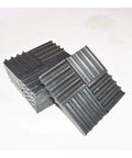 Solid Rubber Low Damping Isolation Pads For Auto Lifts Smooth Out Those Shakes And Keep The Shop Chill While Taking On Heavy Duty Shock Absorption Tasks, black rubber pads stacked showing texture.