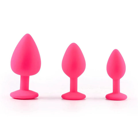 3 Piece Silicone Jeweled Anal Butt Plug Set With 3 Sizes Beginner Anal Trainer Kit For Men And Women displayed in pink