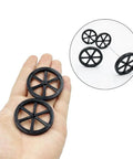 10Pcs 44Mm Model Toy Wheel Set With 5Pcs Shafts And Round Rod Axles for DIY RC Cars, black wheels held in hand