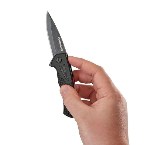 Dead Simple Pocket Knife With Smooth Slide Action And Heavy Duty Plastic Guard Compact Black Hand Tool For Blue Collar Crews and Backyard Heroes Smooth Operator Cutters and Daily Grind Gear in hand.