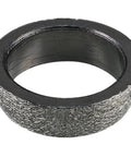 Close-up of graphite exhaust donut gasket, 2.0-inch (51 mm) for header-to-downpipe seal.