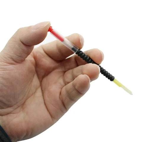 Hand holding Beekeeping Grafting Needles Kit 4 Pcs Durable Queen Bee Larvae Transfer Tool with retractable design