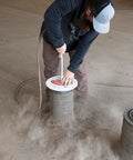 Man using Air Filter Cleaner Heavy Duty Rotating End For Quick Clean Up, Cleans Most Filters In Under One Minute, Made In USA.