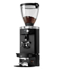 Gen 5 Automatic Espresso Coffee Tamper Built To Nail That Perfect Pull For Mahlkonig E80 Grinders With Adjustable Pressure And Precision Dialing For Straight Up Flawless Puck Prep In White on an espresso grinder machine.