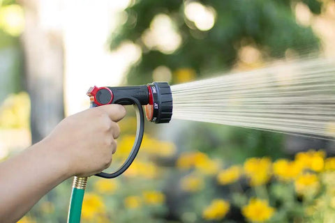 7 Pattern Watering Nozzle With Thumb Control For Backyard Bosses From Rainlike Shower To Powerful Jet in use in garden