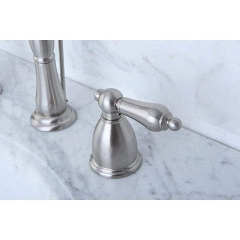 Close-up of Heritage 8 Inch Widespread Lavatory Faucet With Brass Pop Up Dope Matte Black Finish handle on marble surface