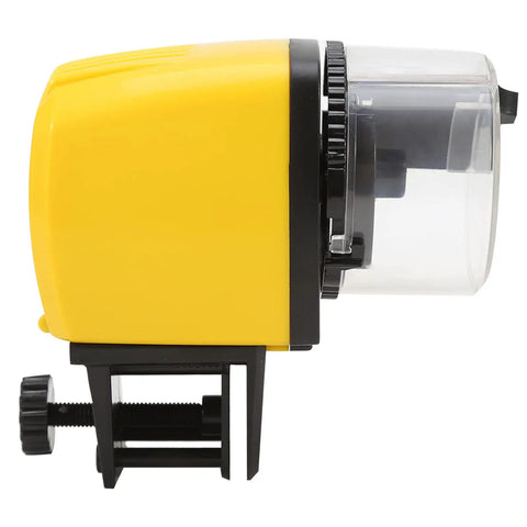 Dead Simple Automatic Fish Feeder With Battery Powered Digital Timer And Sleek LCD Panel side view in yellow plastic, mounted for easy aquarium feeding.