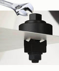 Wrench driving 30mm Sheet Metal Punch Tool with Hexagon Hole Cutter through metal sheet for burr-free holes and steel plate fabrication.