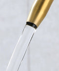 Close-up of NYTFHMS Drinking Water Filter Taps Kitchen Sink, Purifier Faucet, Stainless Steel Gold 1/4, water flowing.
