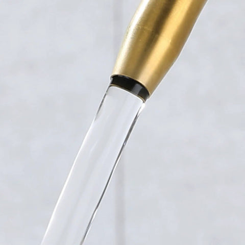 Close-up of NYTFHMS Drinking Water Filter Taps Kitchen Sink, Purifier Faucet, Stainless Steel Gold 1/4, water flowing.