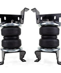 Air Lift LoadLifter 5000 Air Spring Kit components for Chevy Silverado and GMC Sierra, two black air springs with brackets.